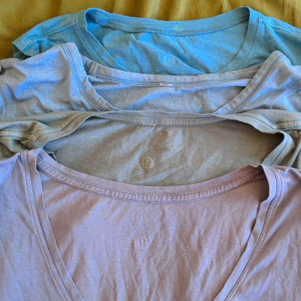 4 Lululemon shirts size large. Good shape - just have too many!